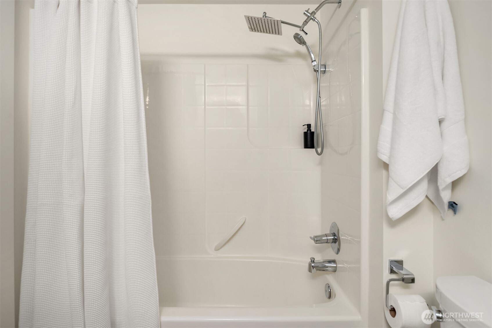 401 9th Avenue North, Unit 210 Seattle, WA 98109 - Photo 7 of 30 a bathroom with a shower