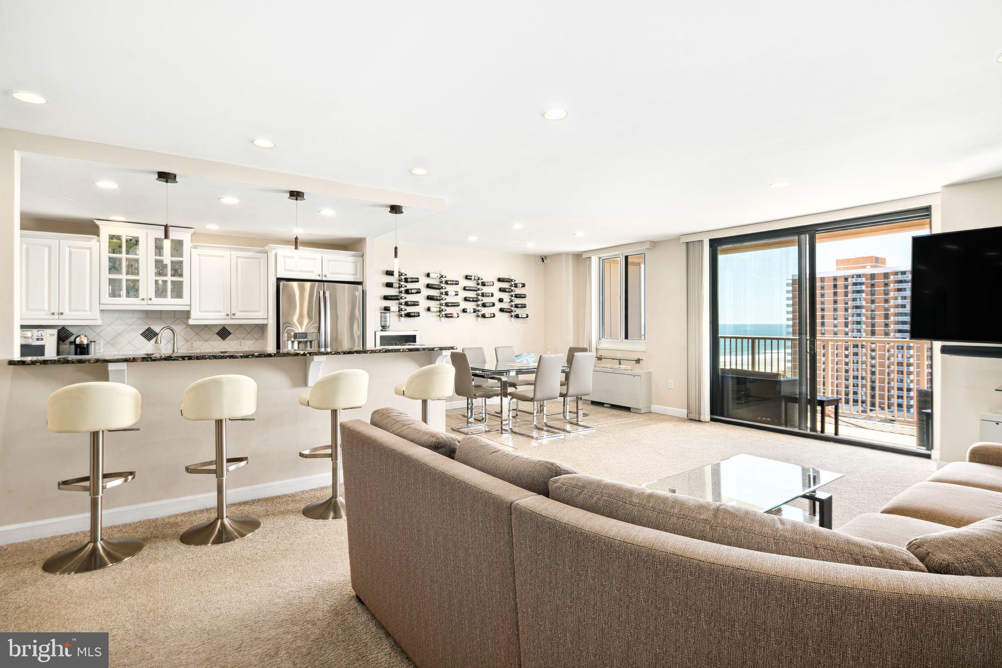 5000 Boardwalk Ventnor City, NJ 08406 - Photo 1 of 44 a living room with furniture and large windows