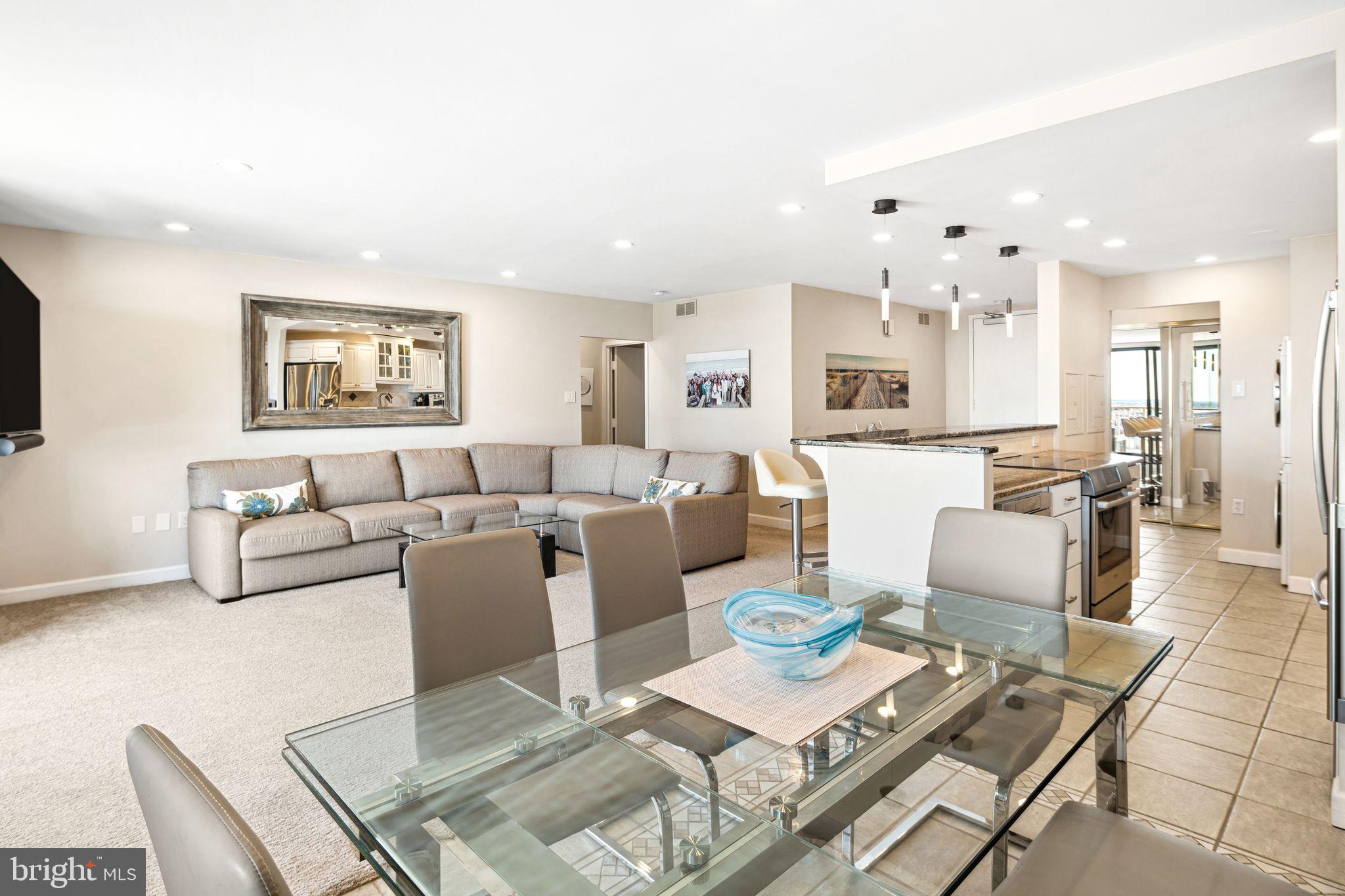 5000 Boardwalk Ventnor City, NJ 08406 - Photo 12 of 44 a living room with furniture and a flat screen tv