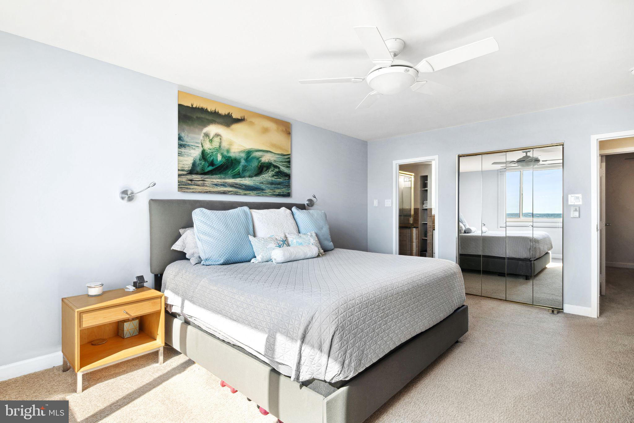 5000 Boardwalk Ventnor City, NJ 08406 - Photo 19 of 44 a bedroom with a bed and a couch