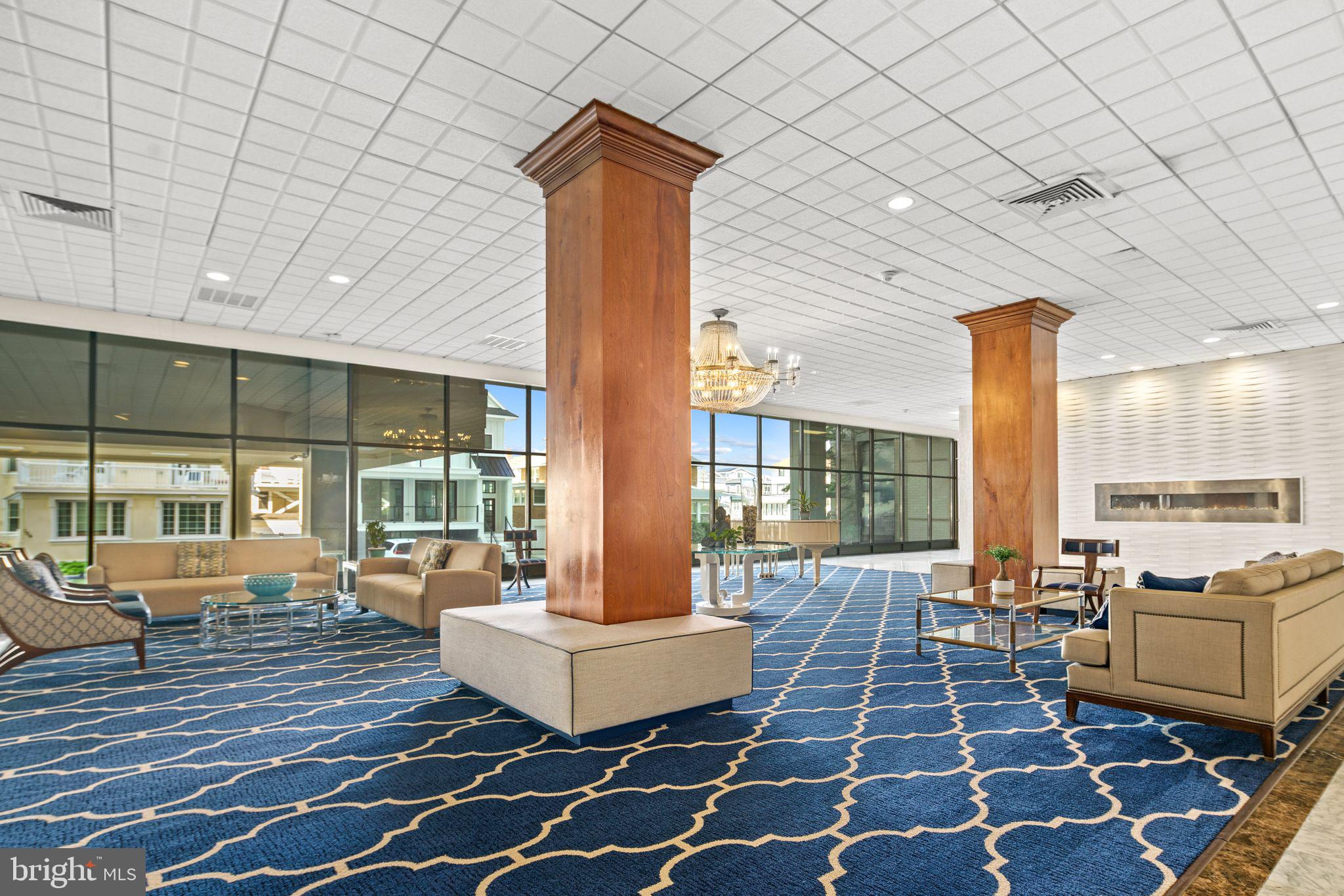 5000 Boardwalk Ventnor City, NJ 08406 - Photo 35 of 44 a balcony with couch and wooden floor