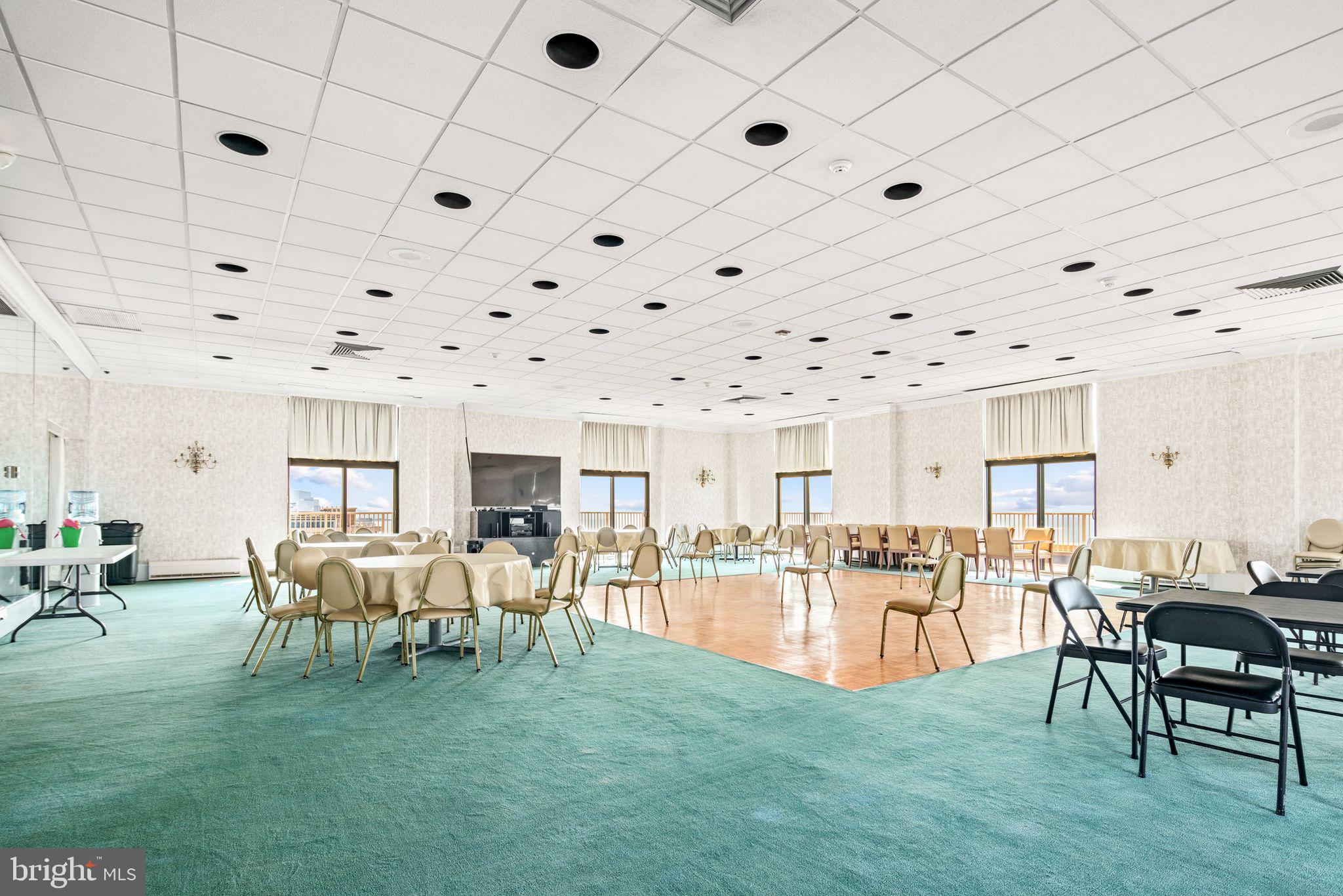 5000 Boardwalk Ventnor City, NJ 08406 - Photo 40 of 44 a living room with furniture and a table