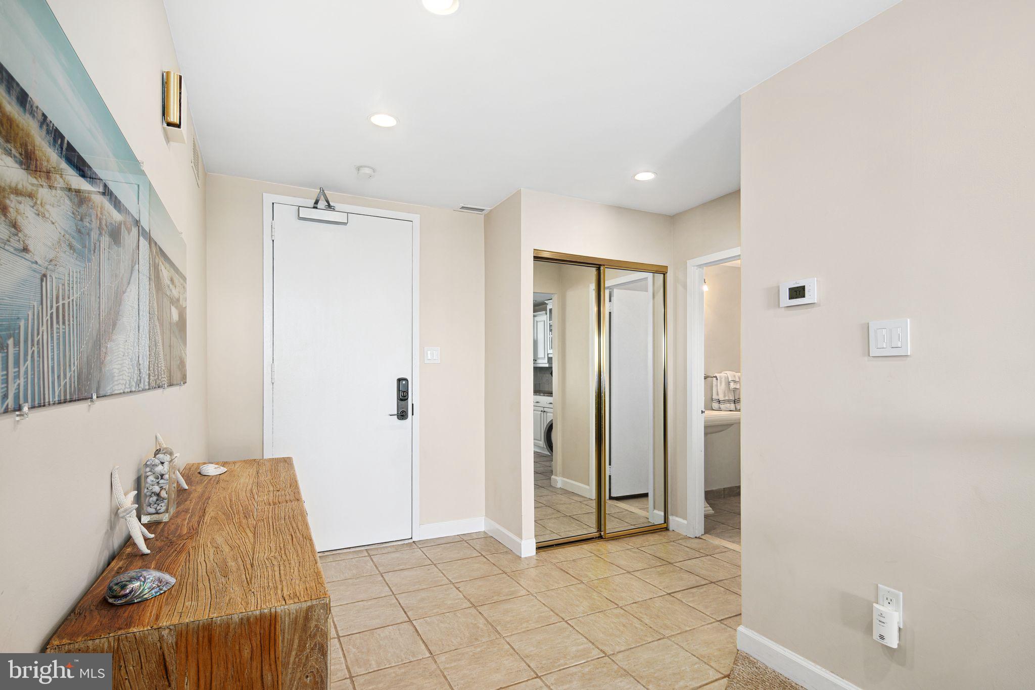 5000 Boardwalk Ventnor City, NJ 08406 - Photo 5 of 44 a view of a livingroom with wooden floor and cabinet