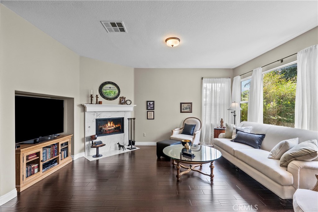 28409 Connick Place Saugus, CA 91350 - Photo 11 of 66 a living room with furniture and a flat screen tv
