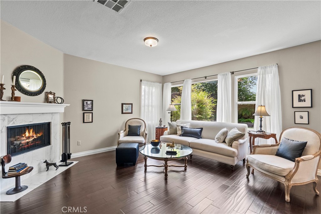28409 Connick Place Saugus, CA 91350 - Photo 12 of 66 a living room with furniture and a fireplace