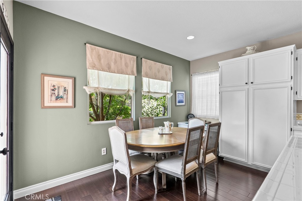 28409 Connick Place Saugus, CA 91350 - Photo 15 of 66 a view of a dining room with furniture window and wooden floor