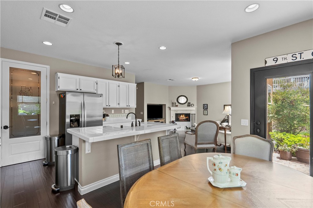 28409 Connick Place Saugus, CA 91350 - Photo 22 of 66 a view of a dining room with furniture window and wooden floor