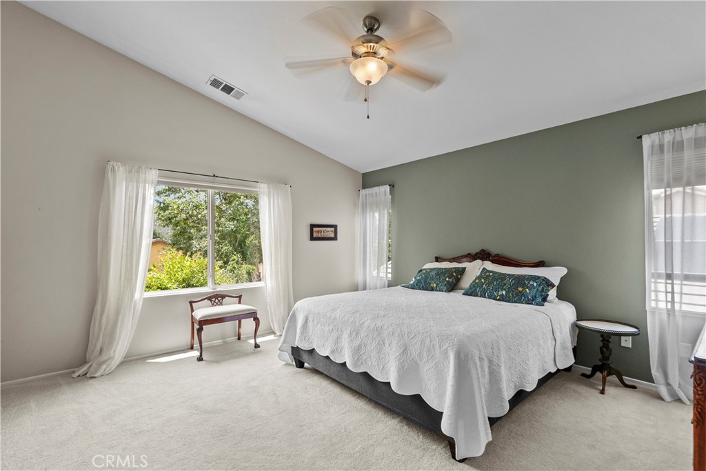 28409 Connick Place Saugus, CA 91350 - Photo 31 of 66 a bedroom with a bed and a chandelier