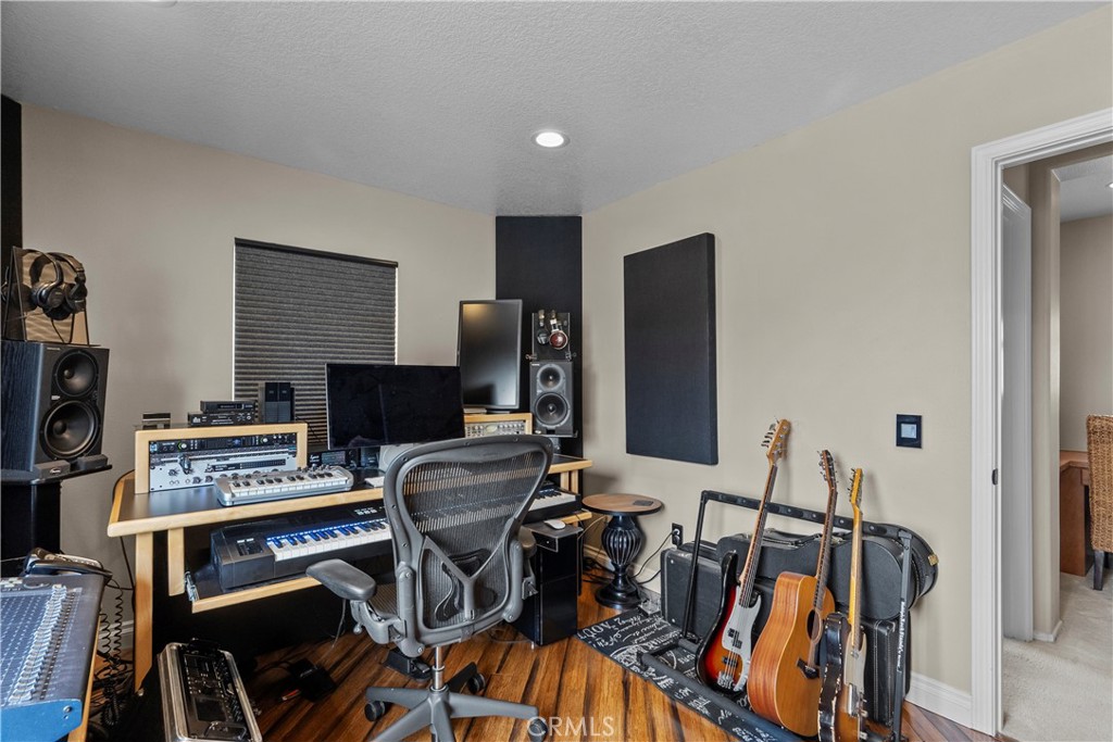 28409 Connick Place Saugus, CA 91350 - Photo 40 of 66 a view of a workspace with furniture and wooden floor