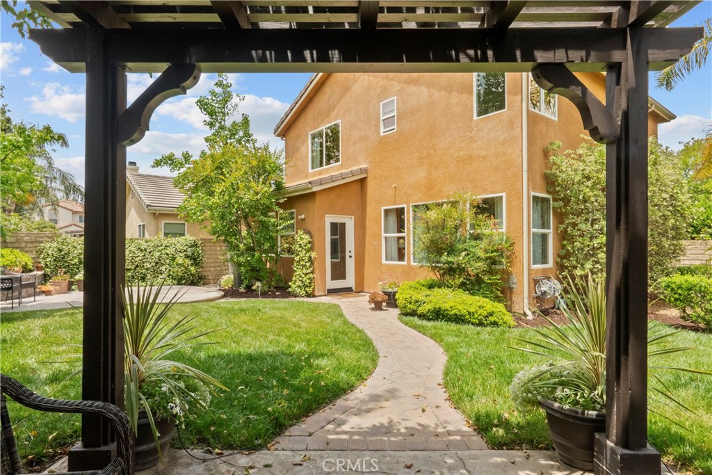 28409 Connick Place Saugus, CA 91350 - Photo 50 of 66 a front view of a house with garden