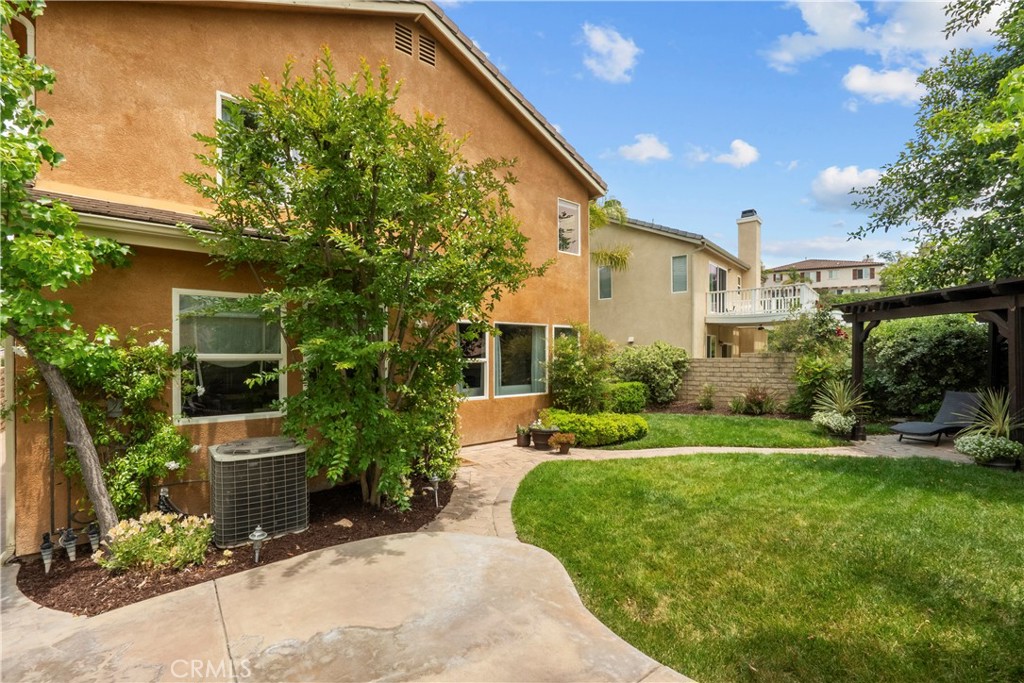 28409 Connick Place Saugus, CA 91350 - Photo 52 of 66 a front view of a house with garden