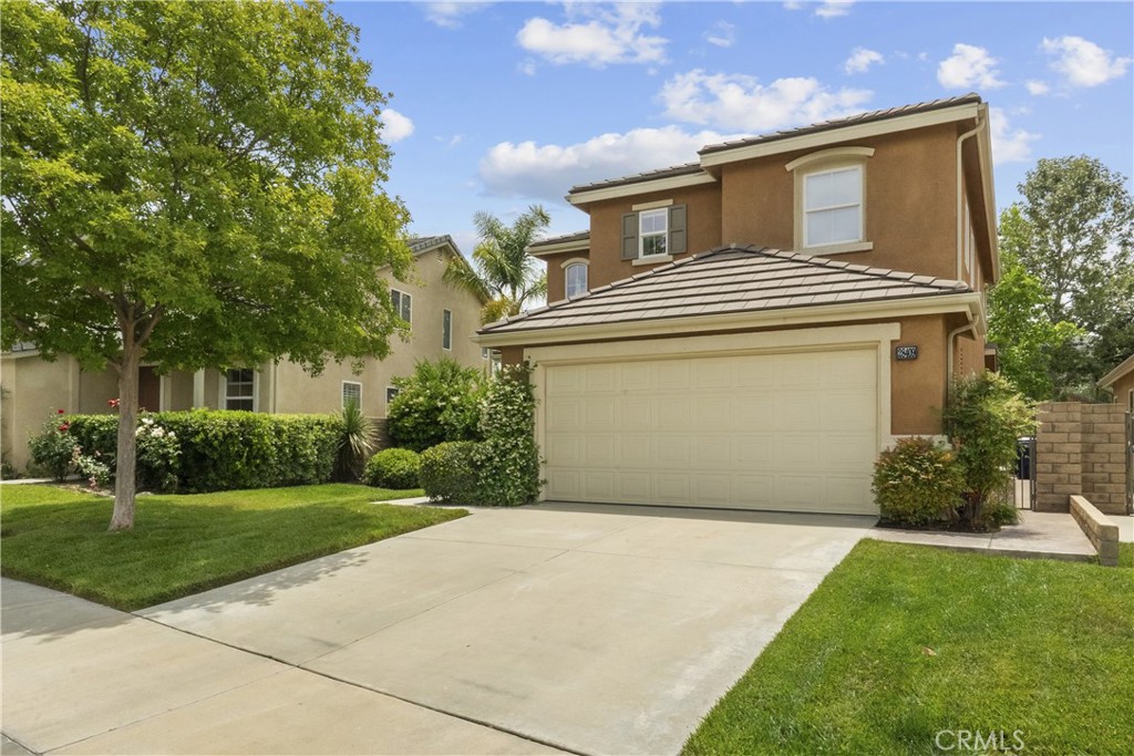 28409 Connick Place Saugus, CA 91350 - Photo 54 of 66 a front view of a house with a garden