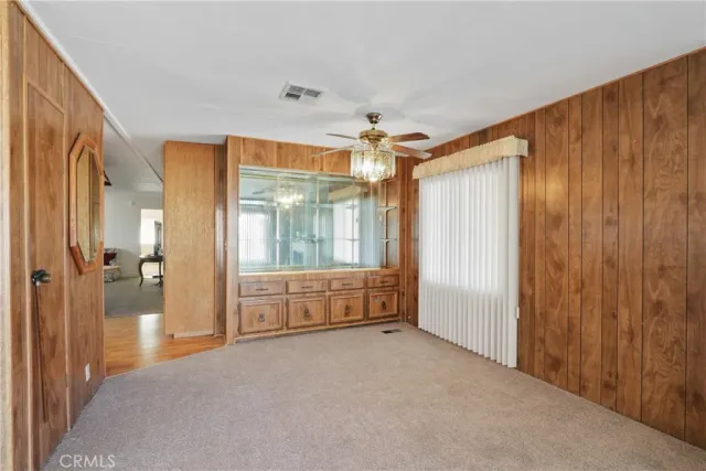 a kitchen with a stove top oven sink and cabinets
