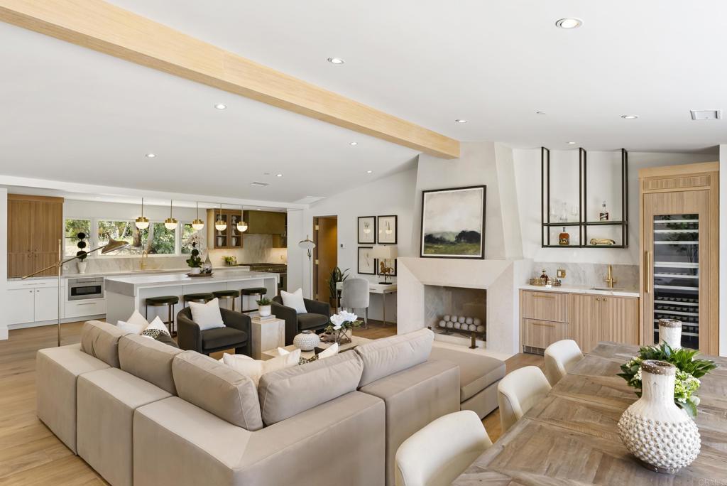 5927 Linea Del Cielo, Unit ELM Rancho Santa Fe, CA 92067 - Photo 3 of 20 a living room with furniture fireplace and window