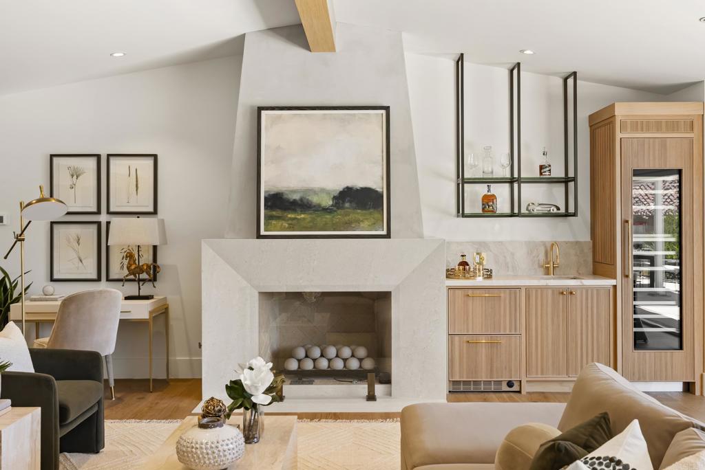 5927 Linea Del Cielo, Unit ELM Rancho Santa Fe, CA 92067 - Photo 4 of 20 a living room with furniture and a fireplace