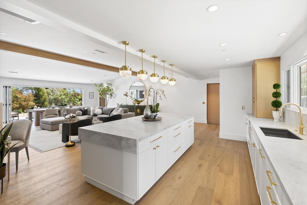 5927 Linea Del Cielo, Unit ELM Rancho Santa Fe, CA 92067 - Photo 8 of 20 a view of living room with furniture and a large window
