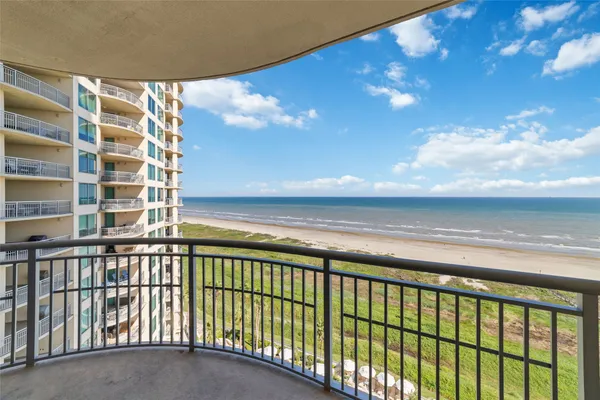 a view of balcony with furniture
