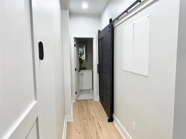 a bathroom with a toilet sink and vanity