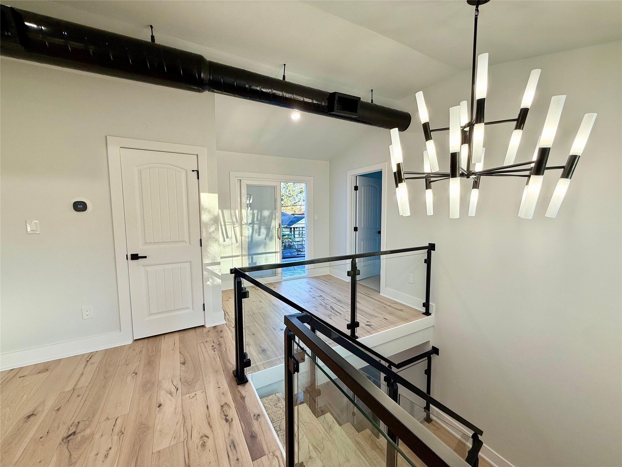 1617 Common Street Houston, TX 77009 - Photo 25 of 50 a view of a hallway with furniture