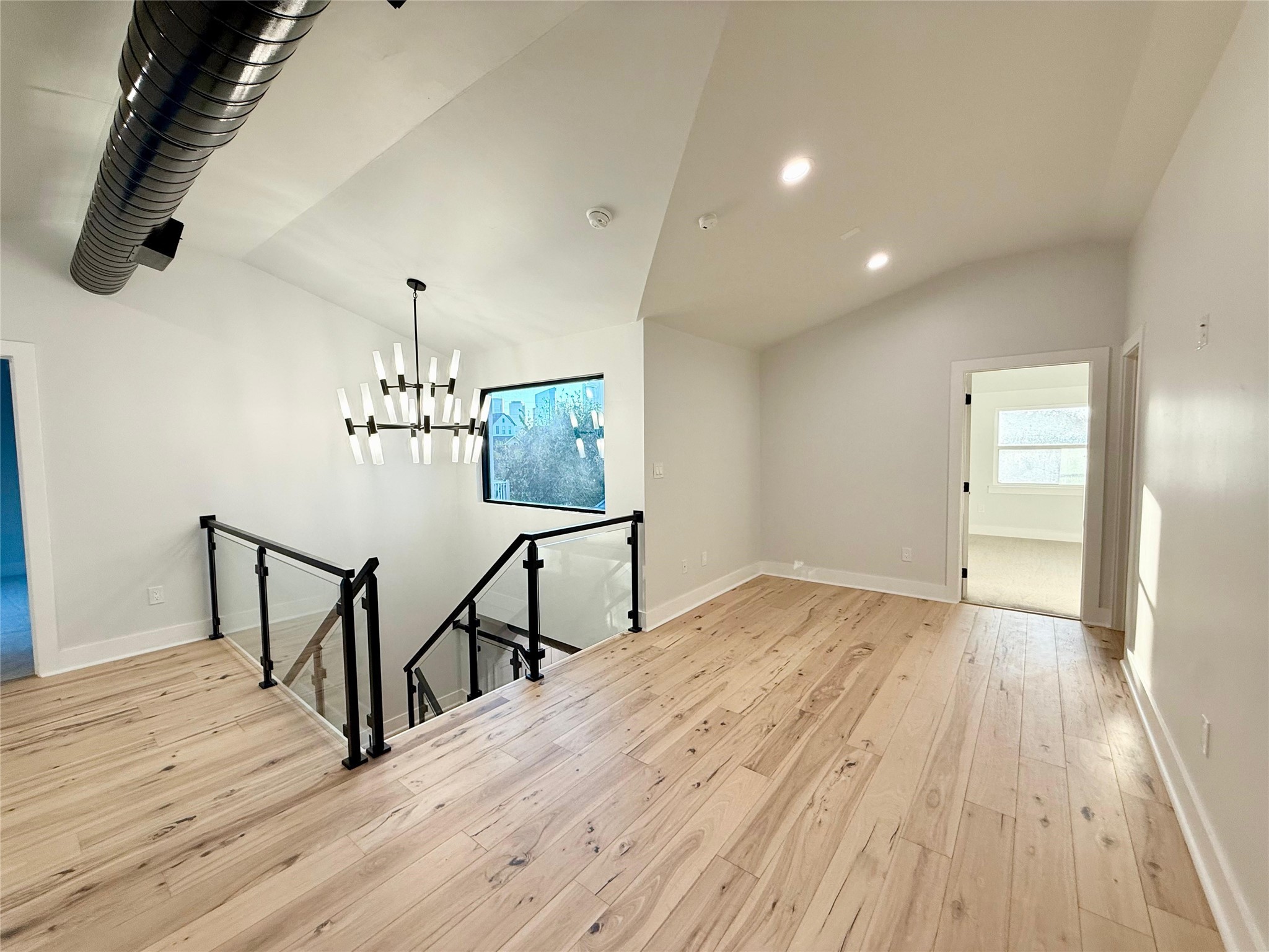 1617 Common Street Houston, TX 77009 - Photo 26 of 50 a view of empty room with wooden floor and fan