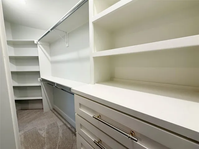 an empty room with a natural light