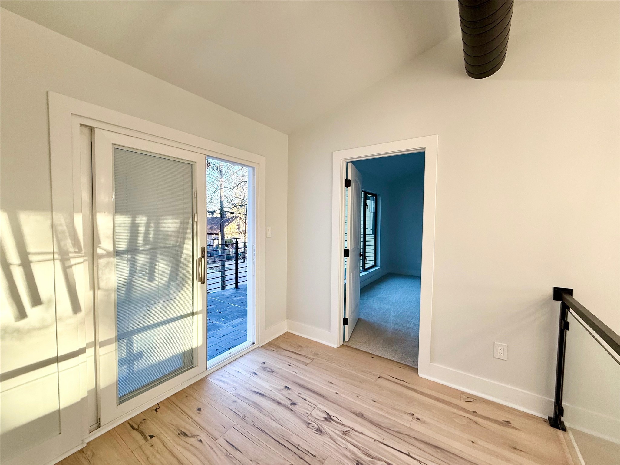 1617 Common Street Houston, TX 77009 - Photo 35 of 50 a view of a room with wooden floor and windows