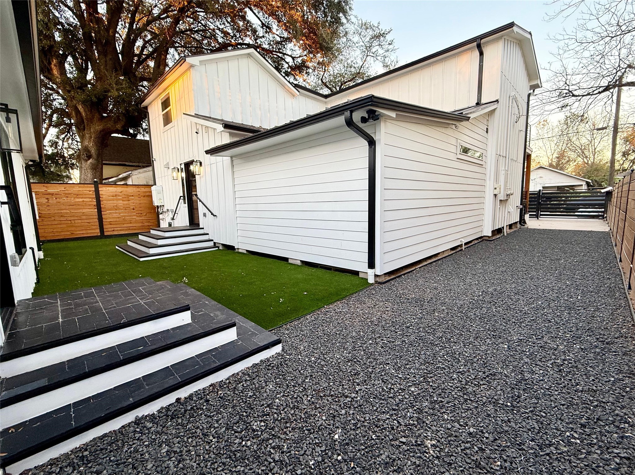 1617 Common Street Houston, TX 77009 - Photo 40 of 50 a view of a white house with a yard