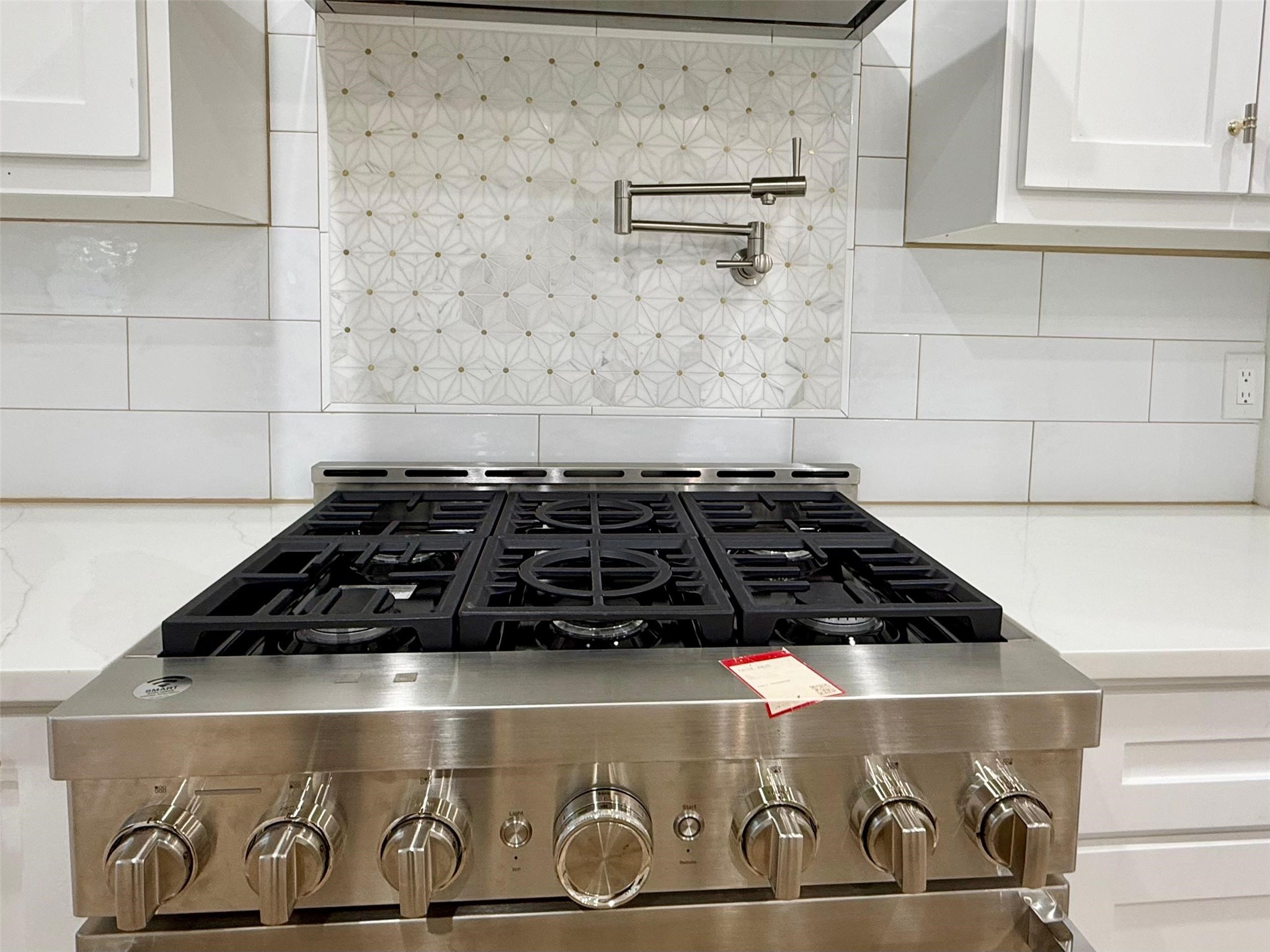 1617 Common Street Houston, TX 77009 - Photo 44 of 50 a close up of a stove top oven sitting inside of a kitchen