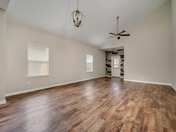 an empty room with windows