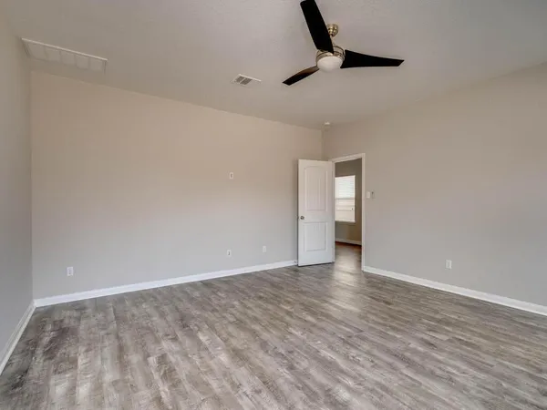 a view of a bathroom from the hallway