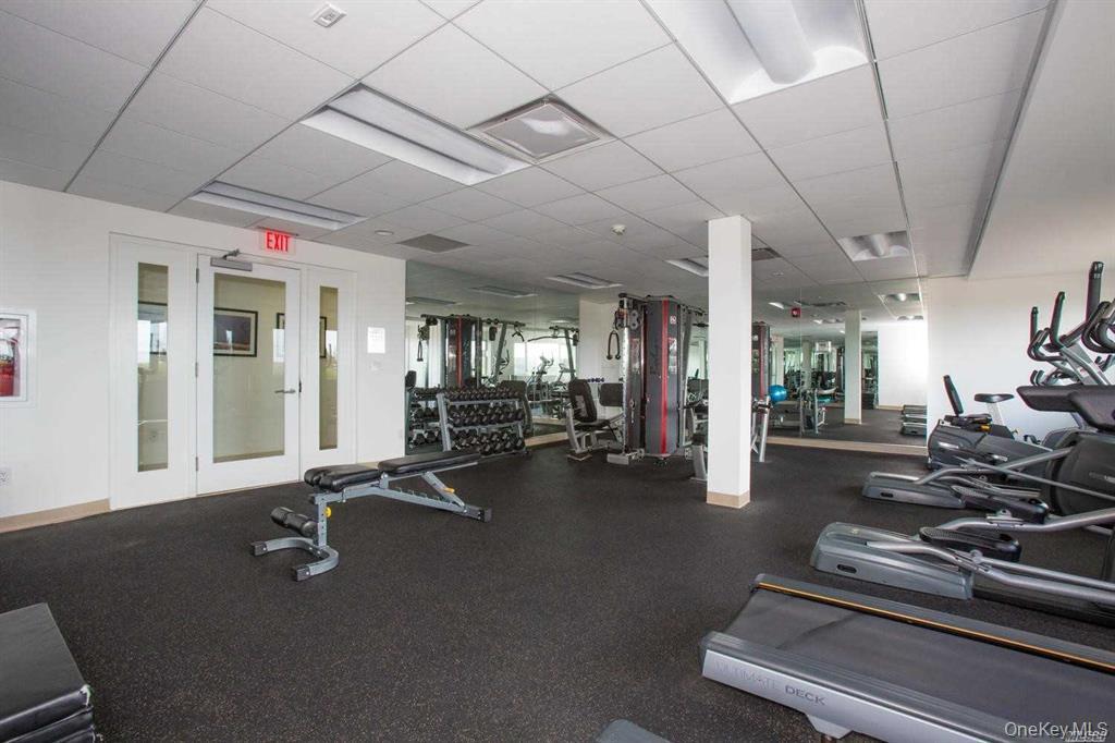 830 Shore Road, Unit 4Q Long Beach, NY 11561 - Photo 19 of 26 a view of a room with gym equipment