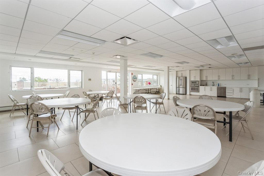 830 Shore Road, Unit 4Q Long Beach, NY 11561 - Photo 21 of 26 a very nice looking dining room with many windows