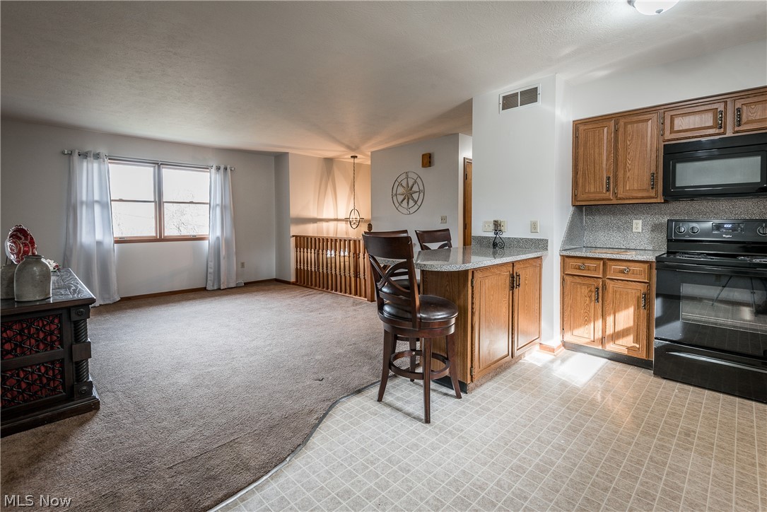 5224 Desert Road Southwest Carrollton, OH 44615 - Photo 10 of 35 OPEN CONCEPT MAKES ENTERTAINING EASY!