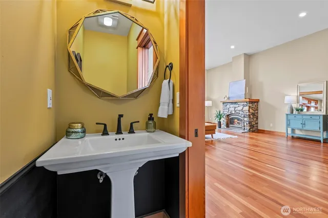a bathroom with a sink and a mirror