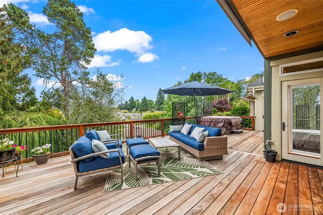a view of a chairs and tables in the balcony