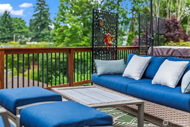 a view of a deck with furniture