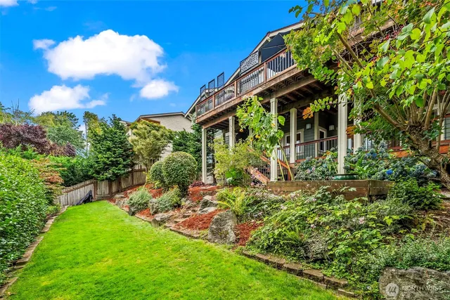 front view of a house with a garden