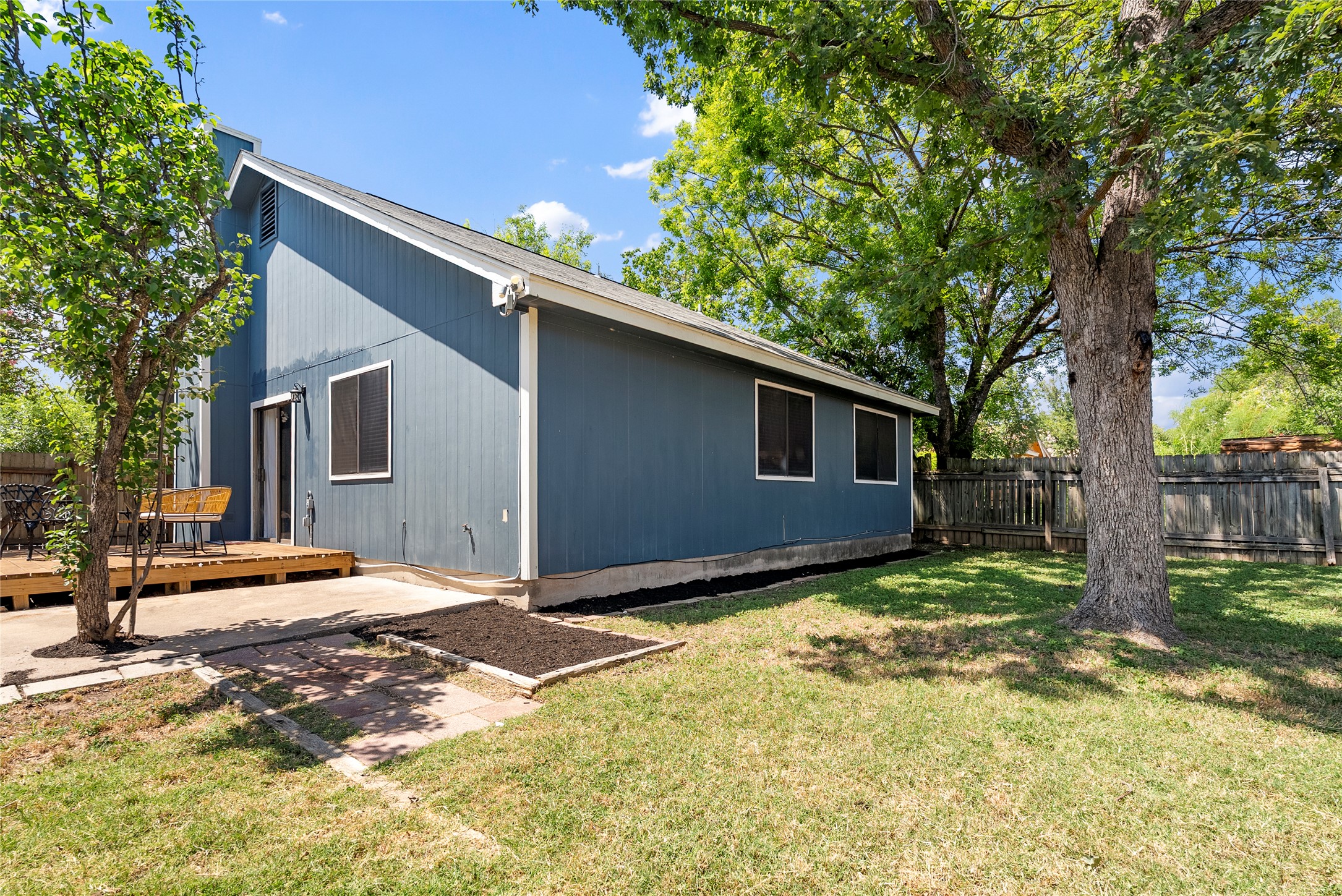 12307 Emery Oaks Road Austin, TX 78758 - Photo 22 of 22 This home sits on a spacious lot that includes a side deck and plenty of room in the backyard for future landscaping or garden beds