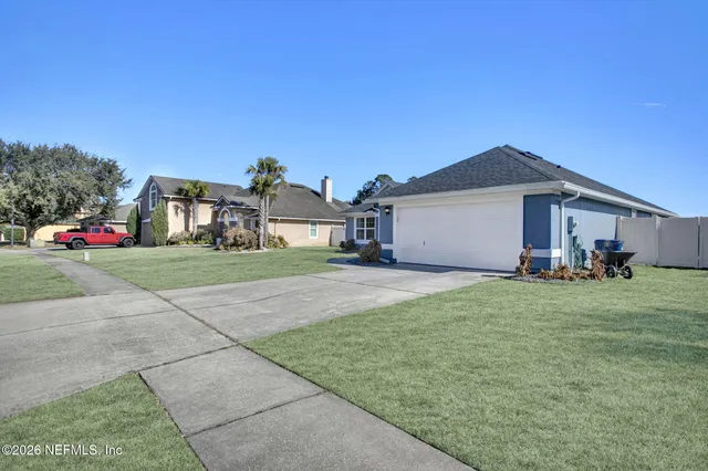 a front view of house with yard