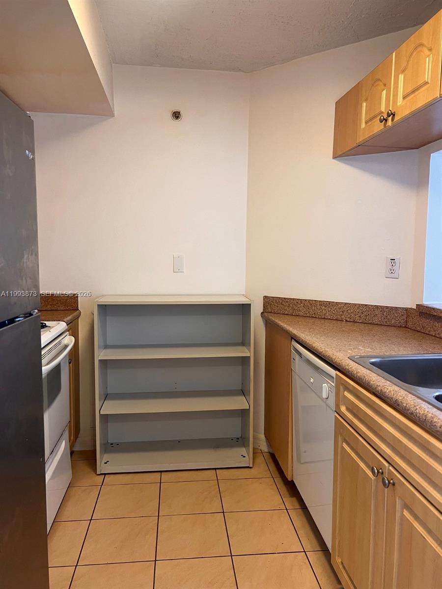 102 Southwest 6th Avenue, Unit 508 Miami, FL 33130 - Photo 13 of 27 a view of storage and utility room in empty room