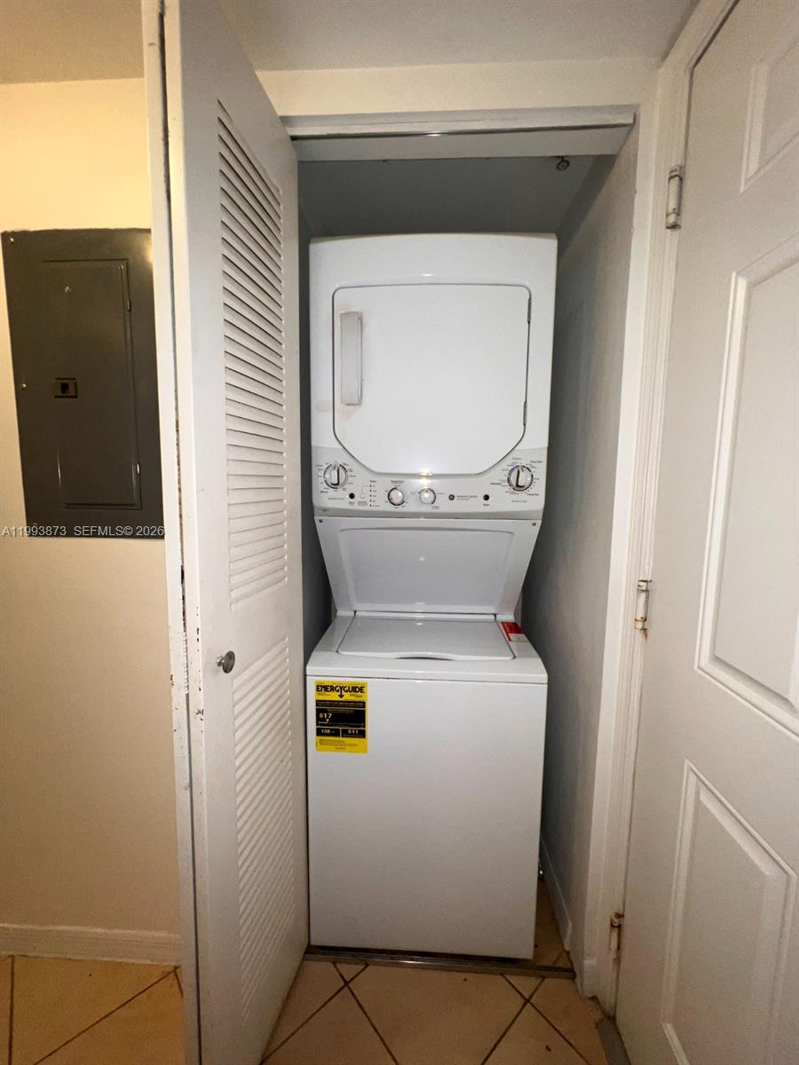 102 Southwest 6th Avenue, Unit 508 Miami, FL 33130 - Photo 15 of 27 a utility room with dryer and washer