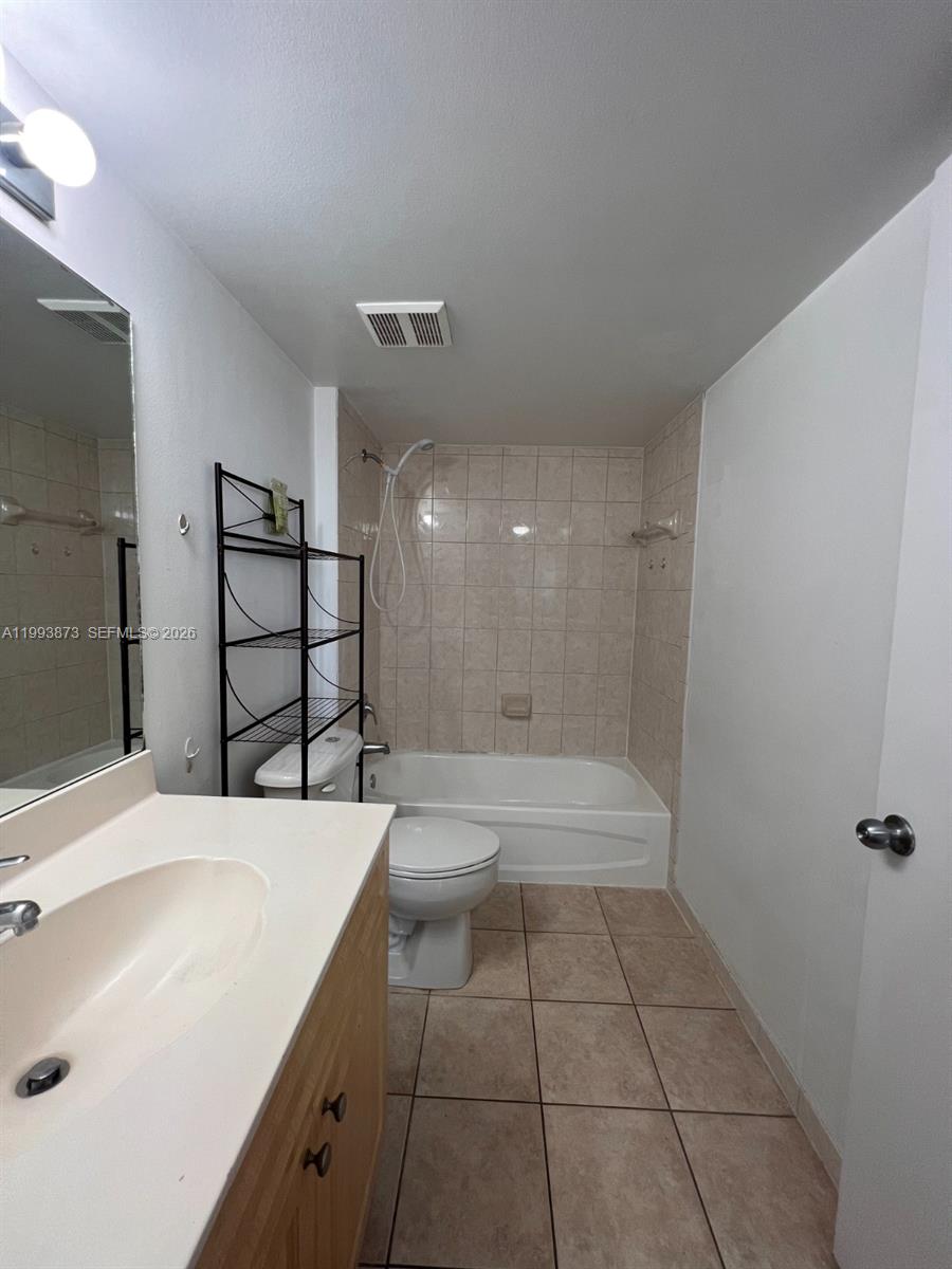 102 Southwest 6th Avenue, Unit 508 Miami, FL 33130 - Photo 22 of 27 a bathroom with a bathtub and a sink