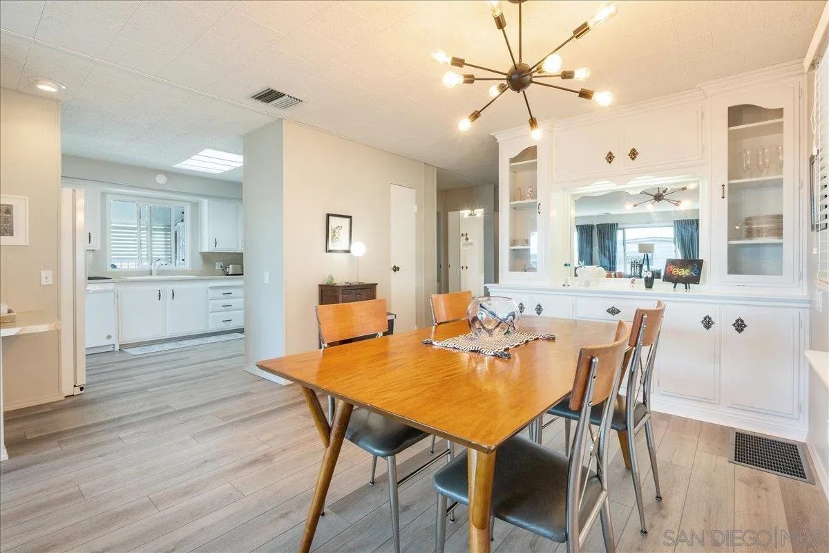 90 Blue Sky Lane Oceanside, CA 92056 - Photo 13 of 31 a dining room with furniture and window
