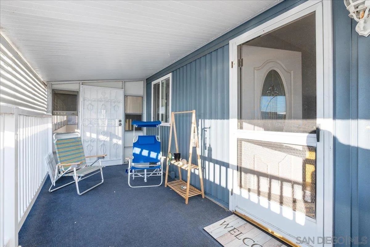 90 Blue Sky Lane Oceanside, CA 92056 - Photo 25 of 31 a view of livingroom with furniture and windows