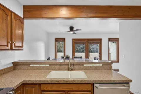 a reading room with furniture and a window