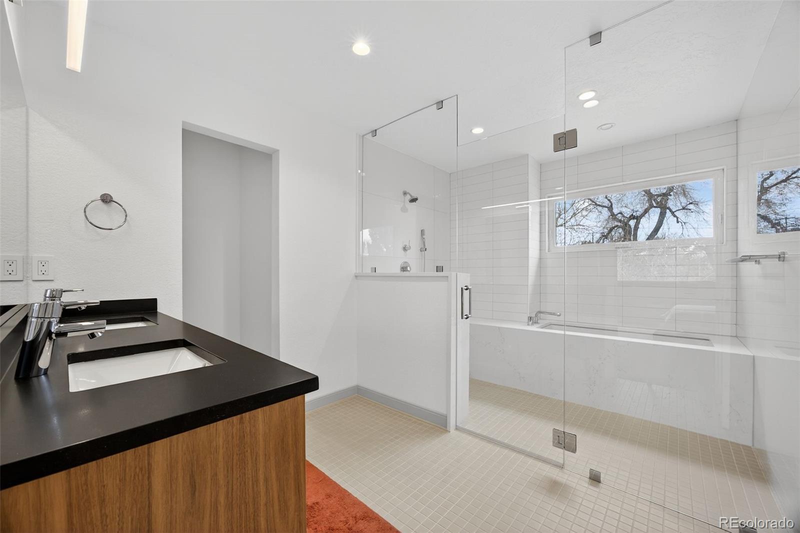 3200 Zephyr Court Wheat Ridge, CO 80033 - Photo 18 of 45 a kitchen with a refrigerator and a stove