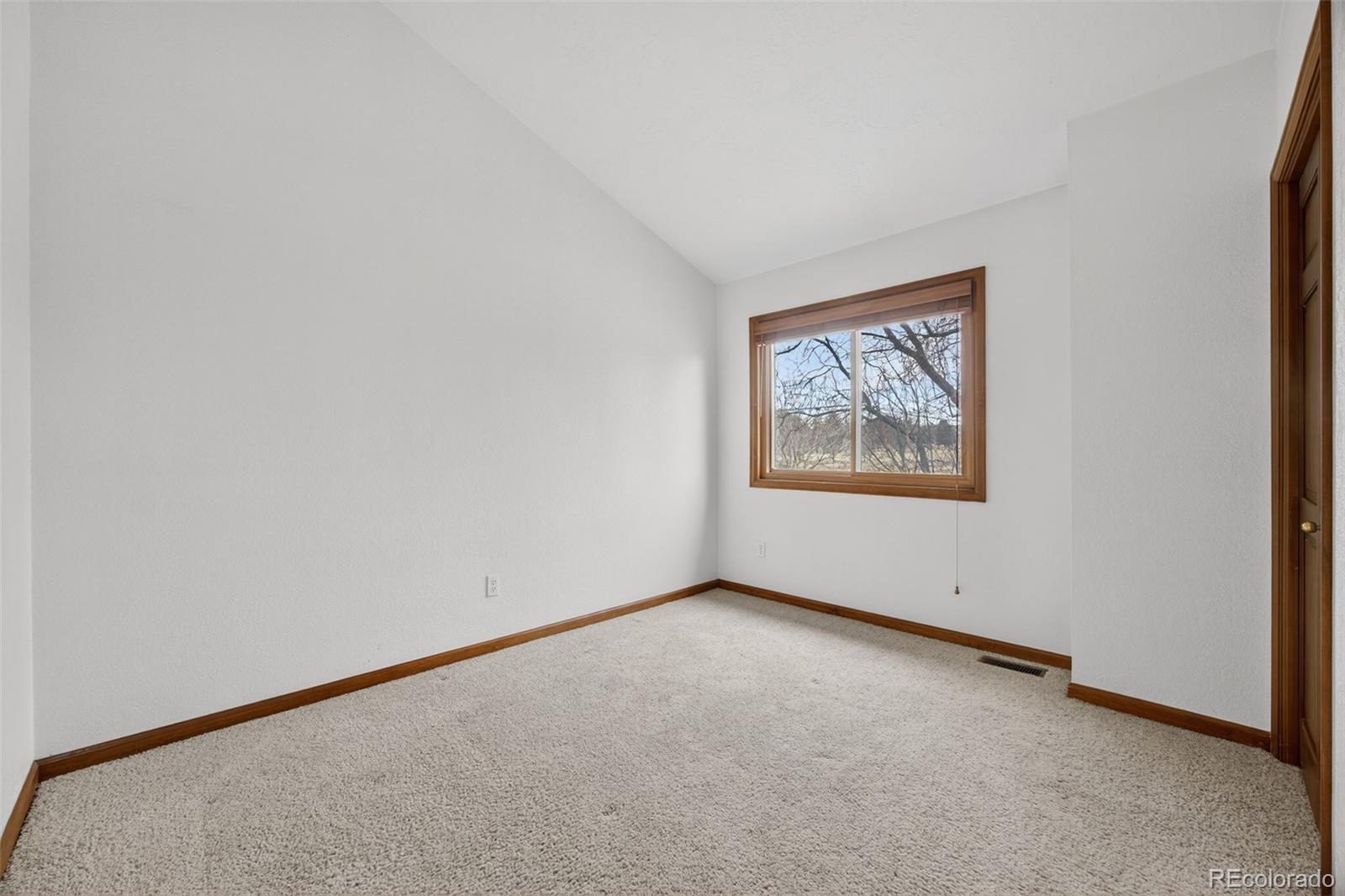 3200 Zephyr Court Wheat Ridge, CO 80033 - Photo 23 of 45 an empty room with a window