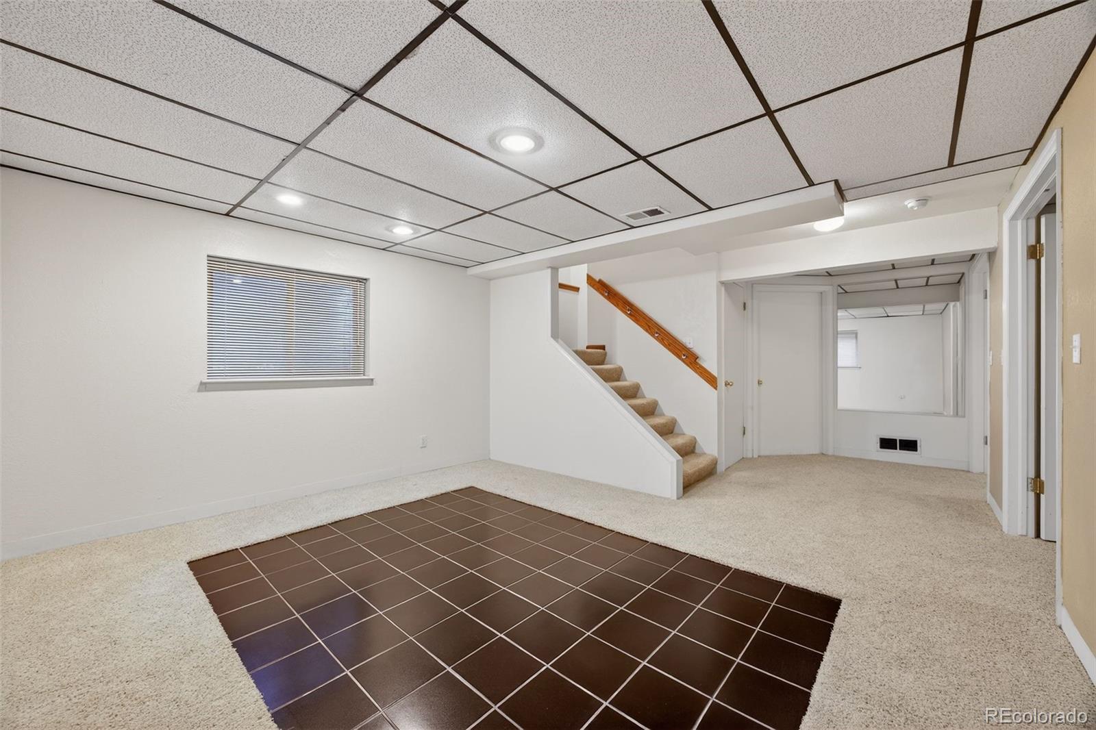 3200 Zephyr Court Wheat Ridge, CO 80033 - Photo 30 of 45 a view of an empty room with stairs