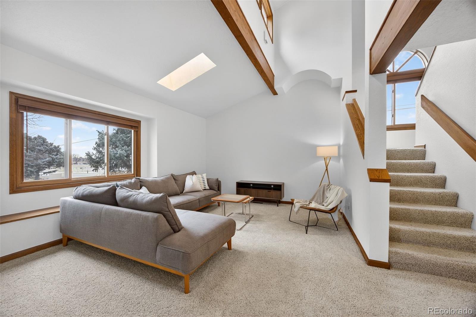 3200 Zephyr Court Wheat Ridge, CO 80033 - Photo 5 of 45 a living room with furniture and a large window