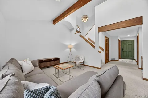 a kitchen with stainless steel appliances granite countertop a refrigerator sink and cabinets